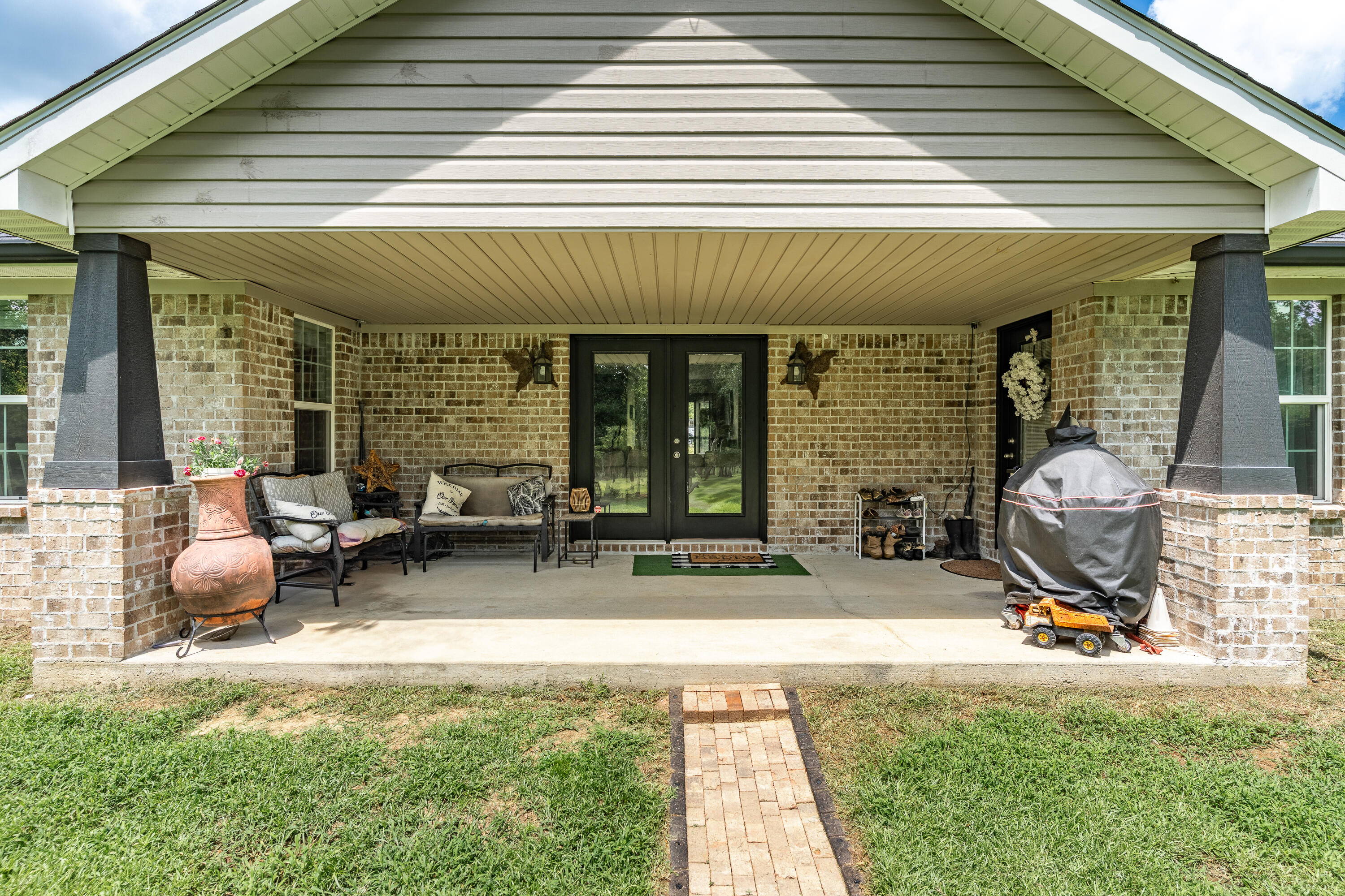 6263 Old River Road Baker, FL 32531 - Photo 23 of 69 a view of a house with backyard space and sitting area