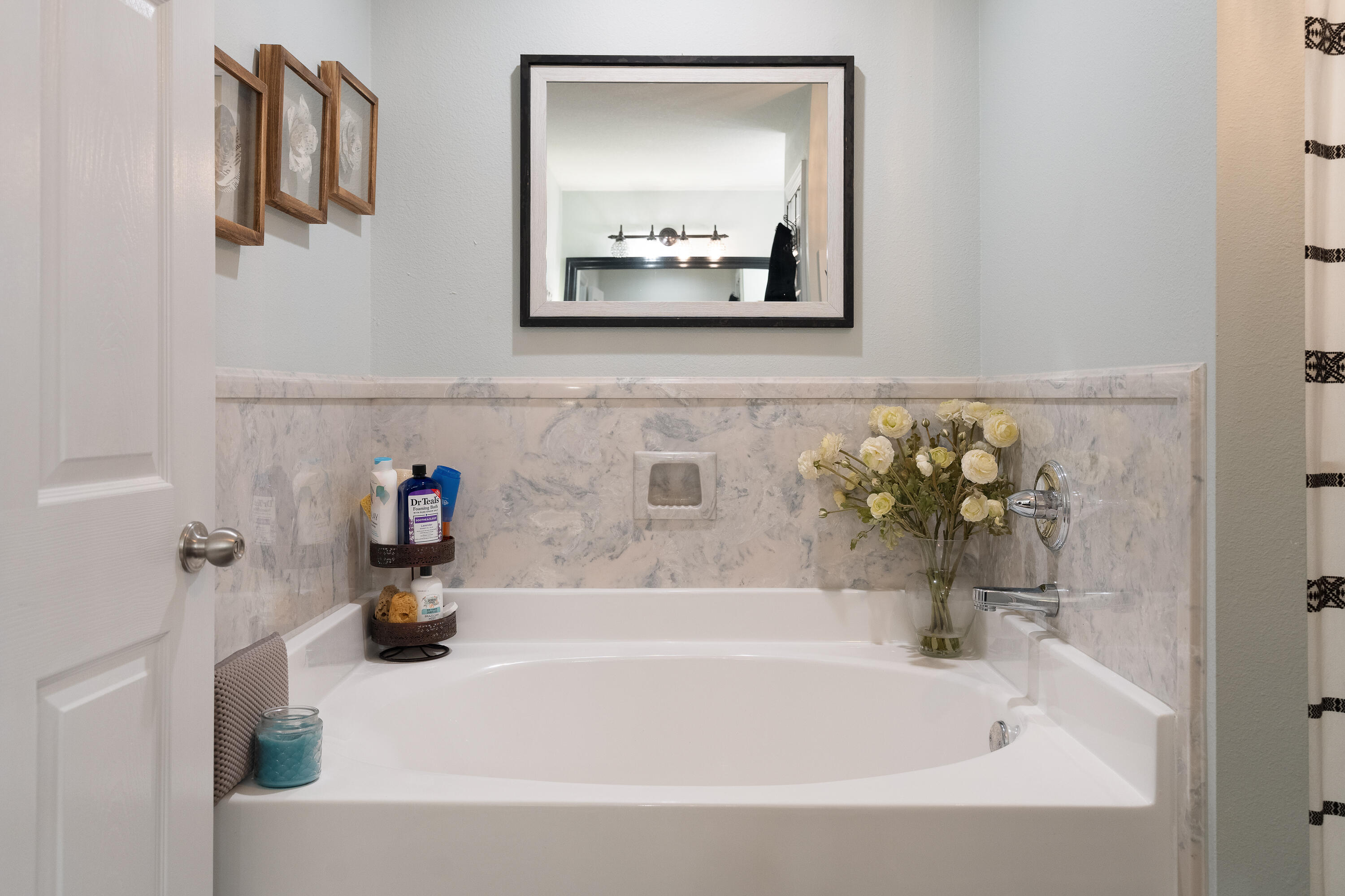 6263 Old River Road Baker, FL 32531 - Photo 47 of 69 a bathroom with a bathtub and a sink