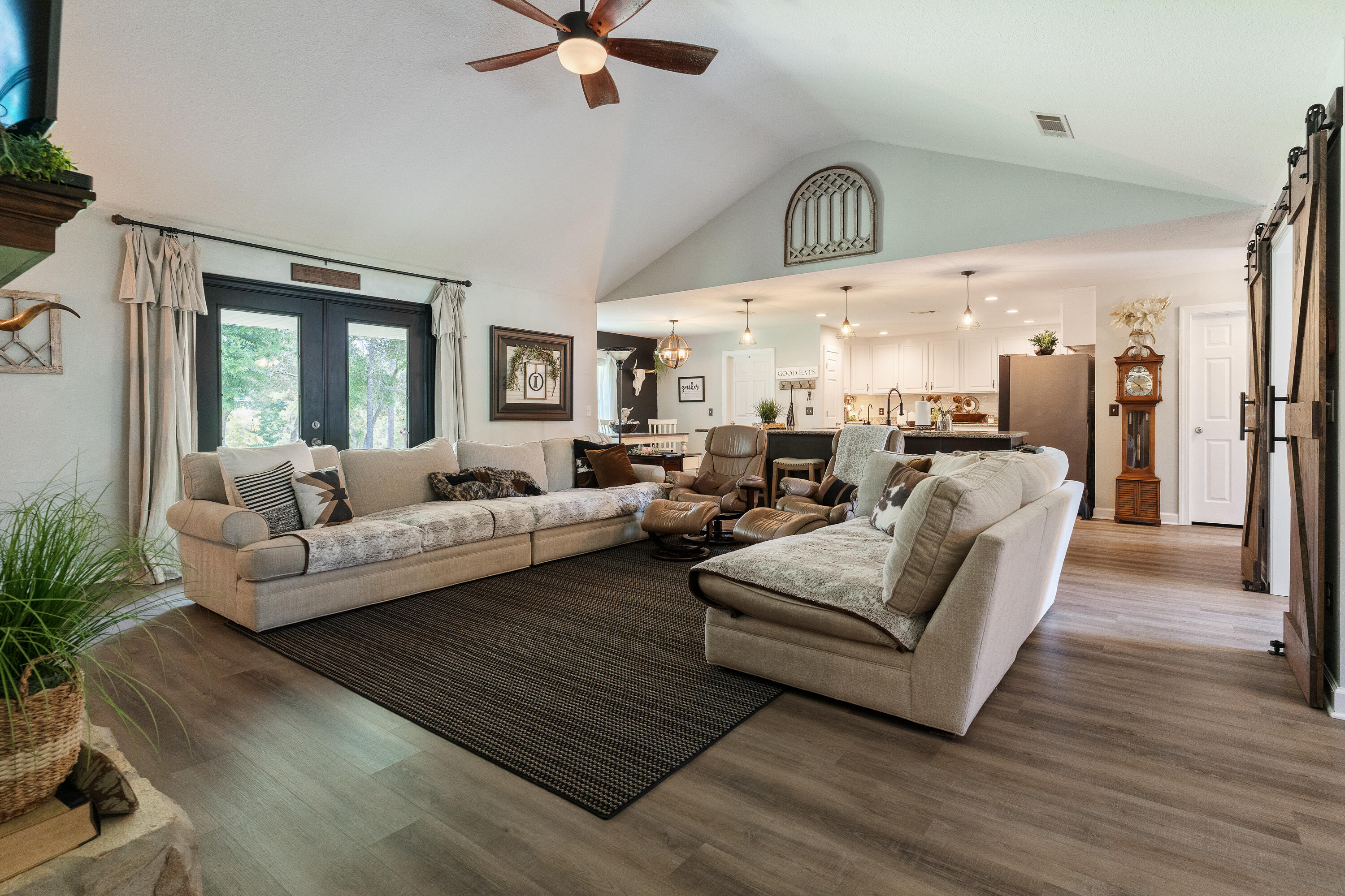 6263 Old River Road Baker, FL 32531 - Photo 59 of 69 a living room with furniture and a wooden floor