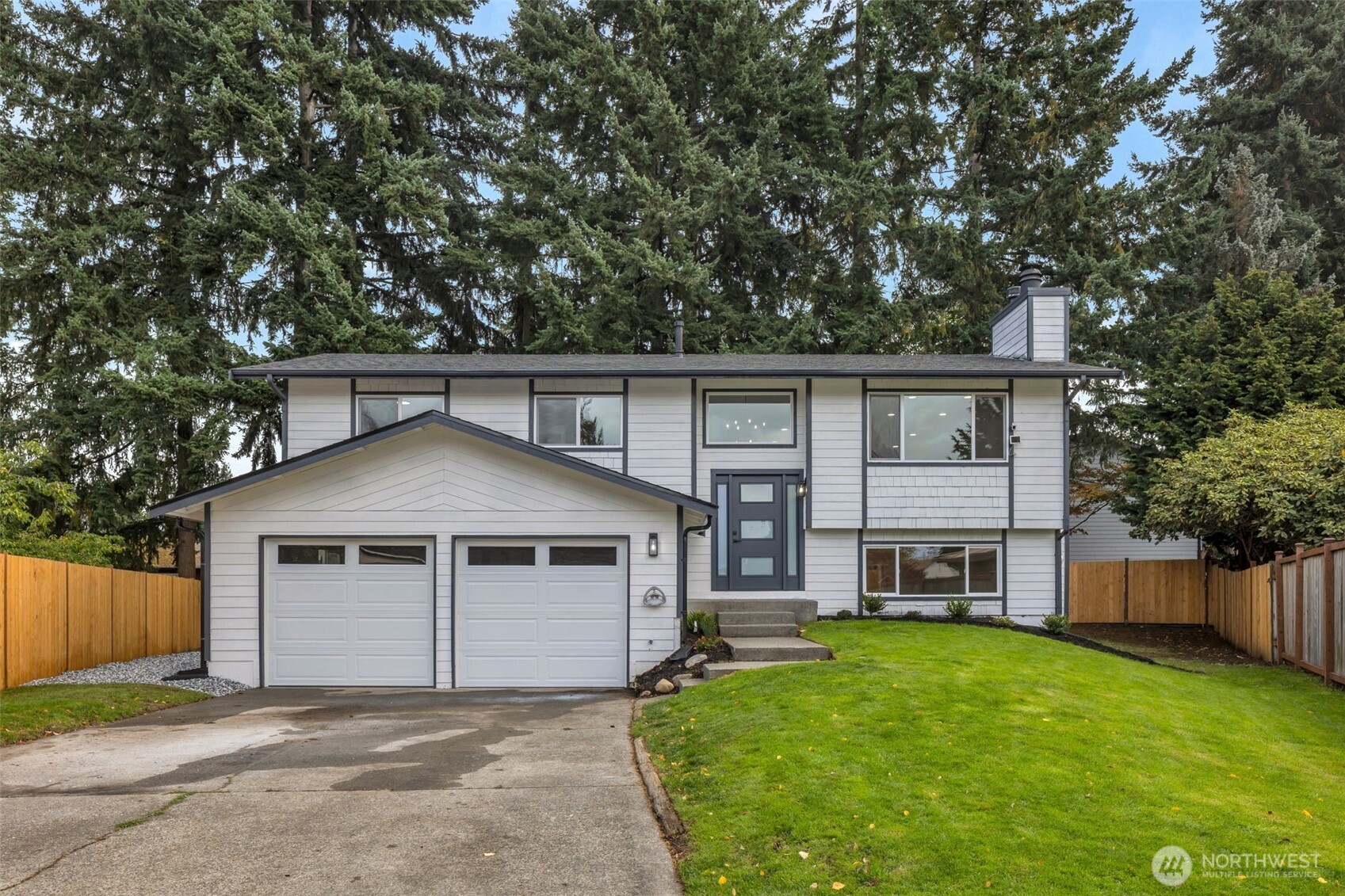 3611 Southwest 342nd Court Federal Way, WA 98023 - Photo 1 of 27 front view of a house with a yard