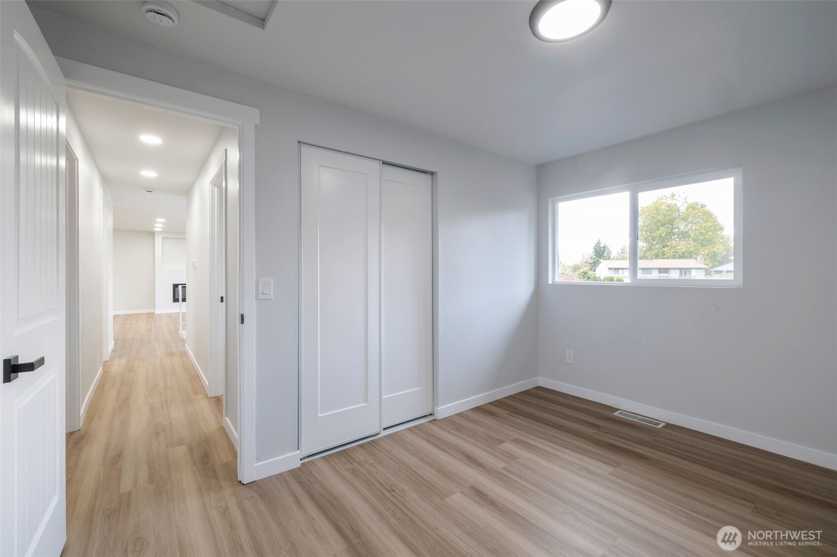 3611 Southwest 342nd Court Federal Way, WA 98023 - Photo 12 of 27 a view of a room with wooden floor and windows