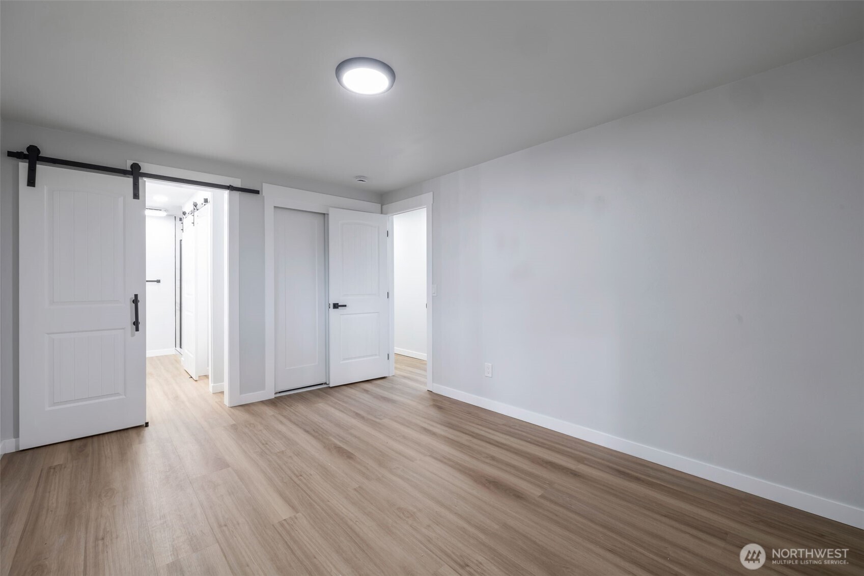3611 Southwest 342nd Court Federal Way, WA 98023 - Photo 15 of 27 a view of an empty room and wooden floor