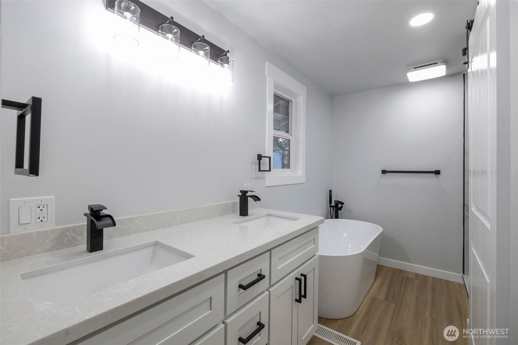 3611 Southwest 342nd Court Federal Way, WA 98023 - Photo 18 of 27 a bathroom with a sink and a mirror