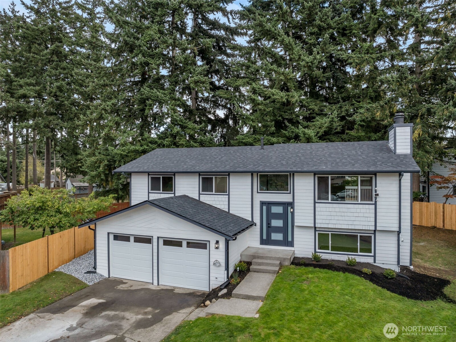3611 Southwest 342nd Court Federal Way, WA 98023 - Photo 25 of 27 front view of a house with a yard