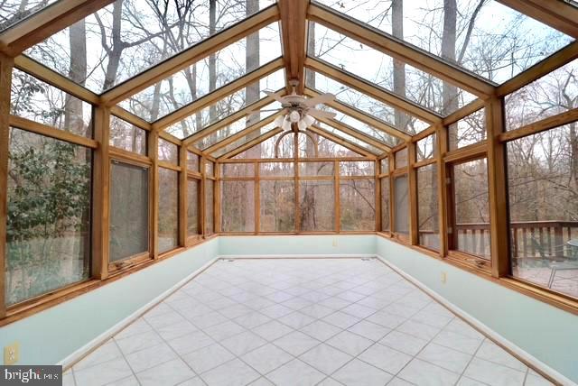 11312 Myrtle Lane Reston, VA 20191 - Photo 4 of 23 Huge sunroom overlooks wooded trails