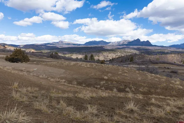 a view of an outdoor space and mountain view