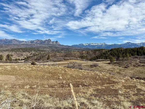 a view of lake with mountain