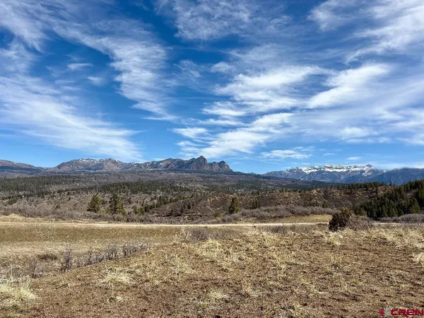 a view of mountain with lake view