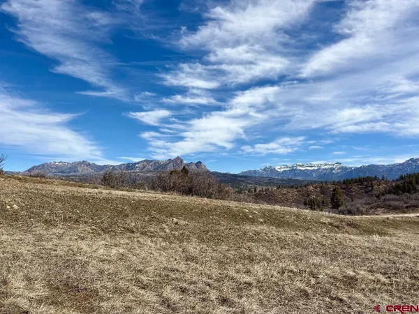 a view of mountain with lake view