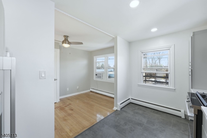 5 Josh Court Clifton, NJ 07011 - Photo 12 of 20 an empty room with windows and closet