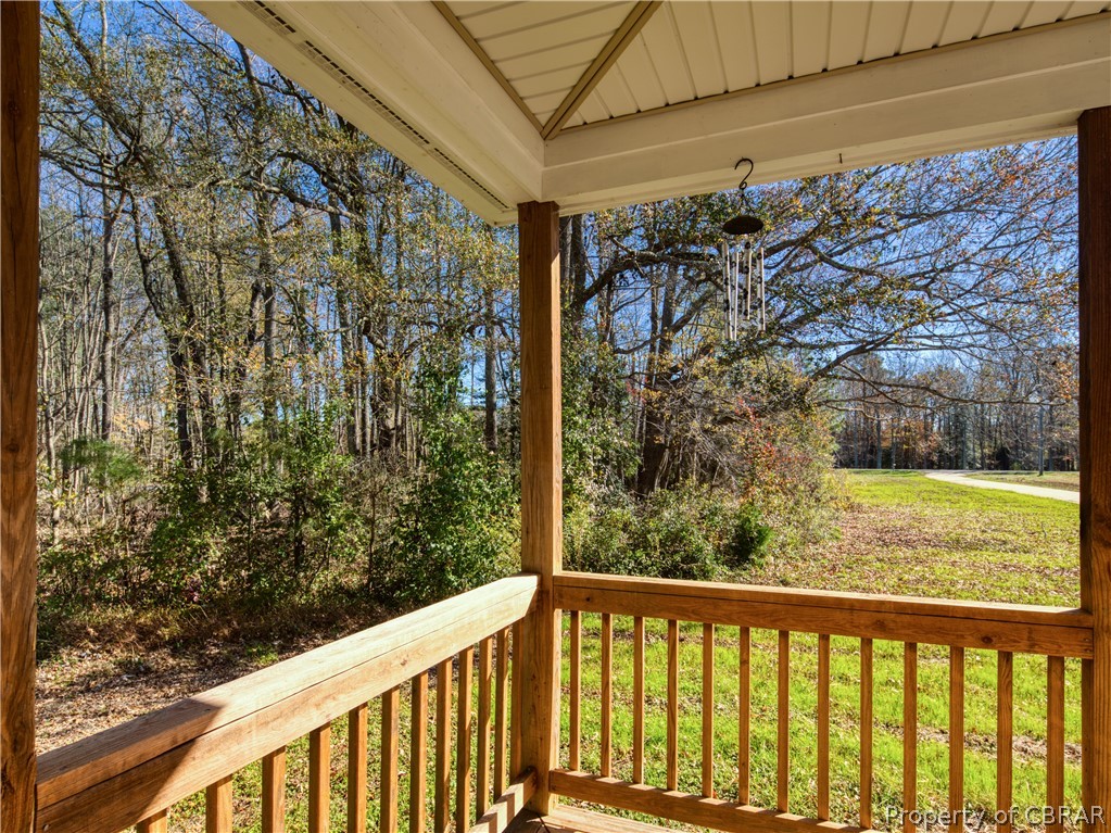 921 Buckley Hall Road Dutton, VA 23050 - Photo 7 of 42 a view of a balcony with next to a yard