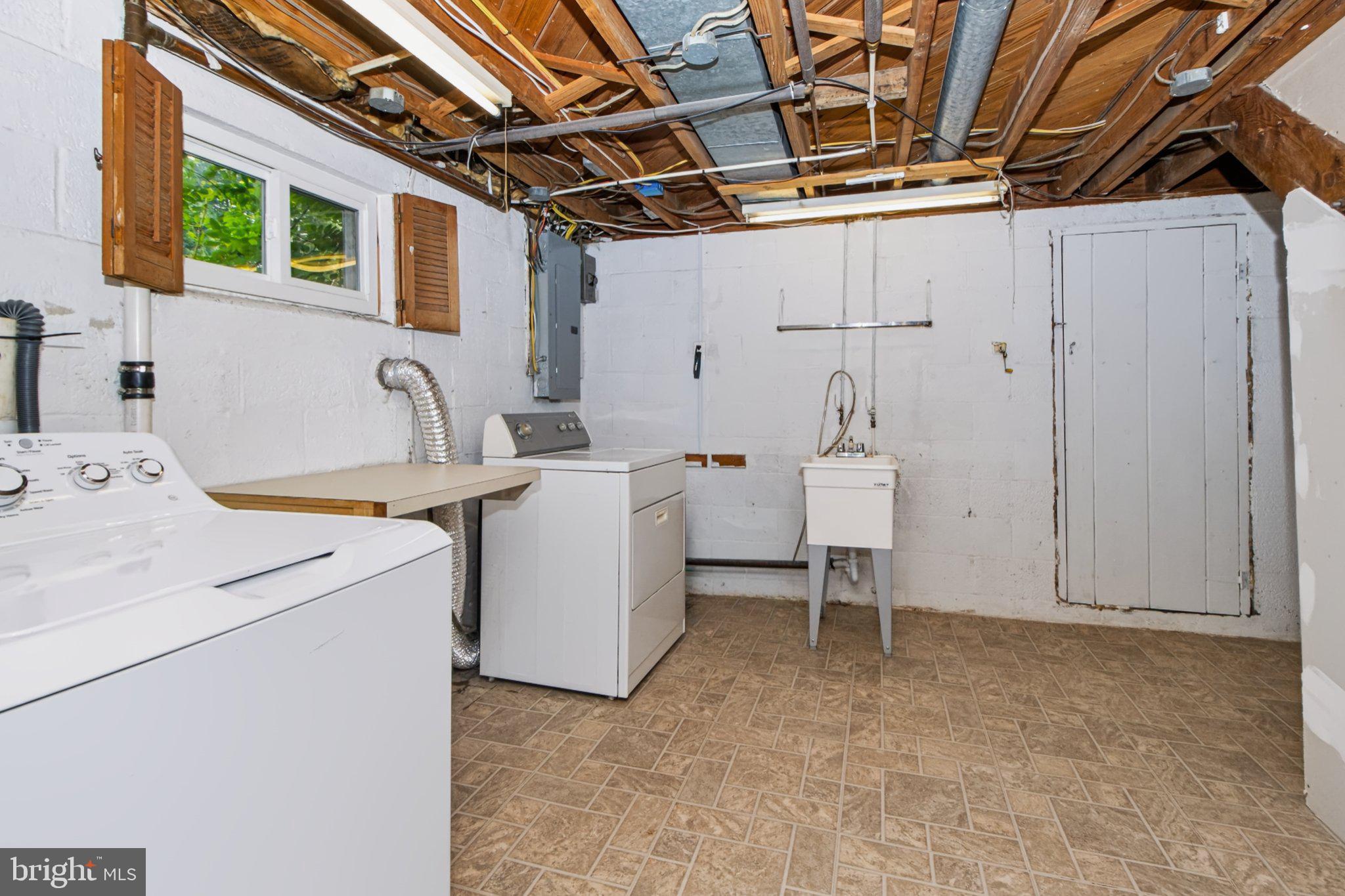 490 Pine Ridge Circle Lewisberry, PA 17339 - Photo 25 of 28 Spacious laundry area with natural light.