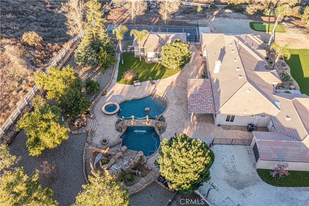 24195 Spencer Butte Drive Perris, CA 92570 - Photo 3 of 60 an aerial view of a house with a swimming pool