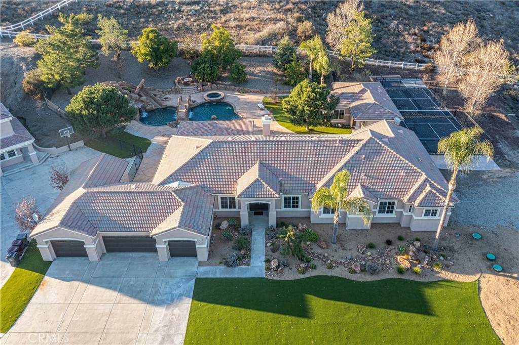 24195 Spencer Butte Drive Perris, CA 92570 - Photo 34 of 60 an aerial view of a house with swimming pool garden and patio