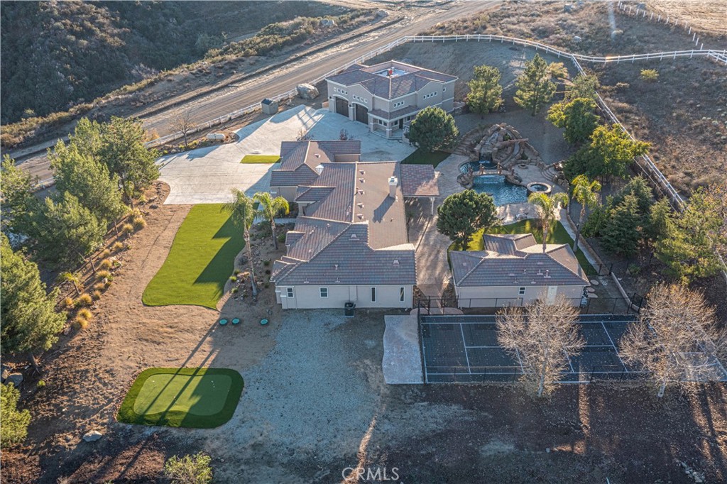 24195 Spencer Butte Drive Perris, CA 92570 - Photo 48 of 60 an aerial view of a house with a yard