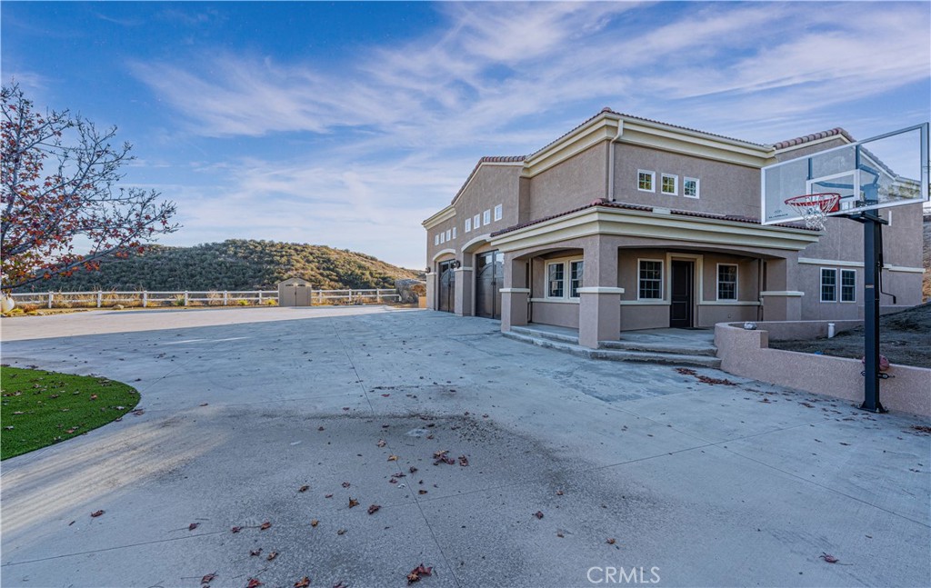 24195 Spencer Butte Drive Perris, CA 92570 - Photo 51 of 60 front view of a house with a yard