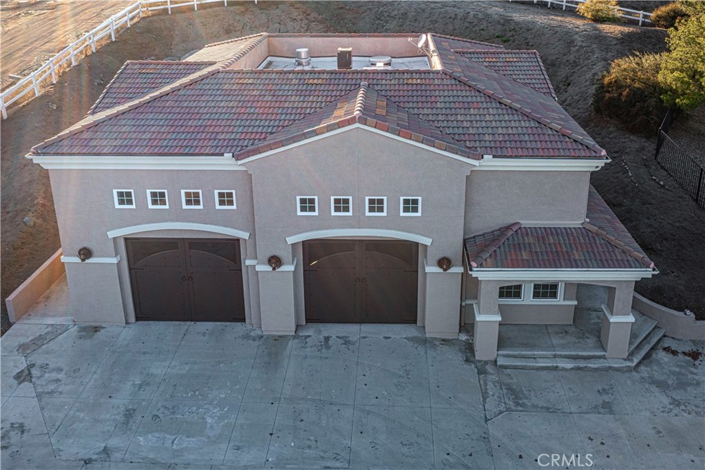 24195 Spencer Butte Drive Perris, CA 92570 - Photo 52 of 60 front view of a house with a balcony