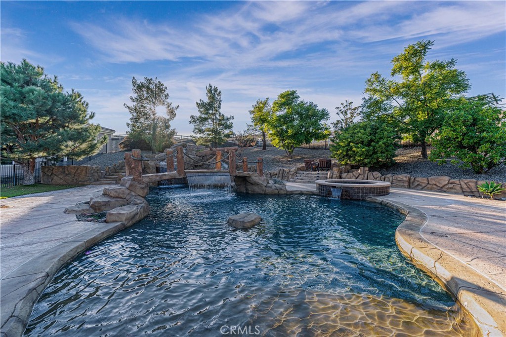 24195 Spencer Butte Drive Perris, CA 92570 - Photo 54 of 60 a backyard of a house with lots of green space