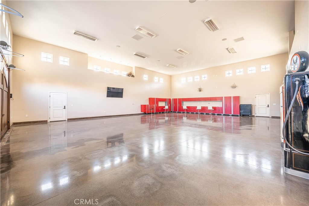 24195 Spencer Butte Drive Perris, CA 92570 - Photo 8 of 60 a view of a room with gym equipment