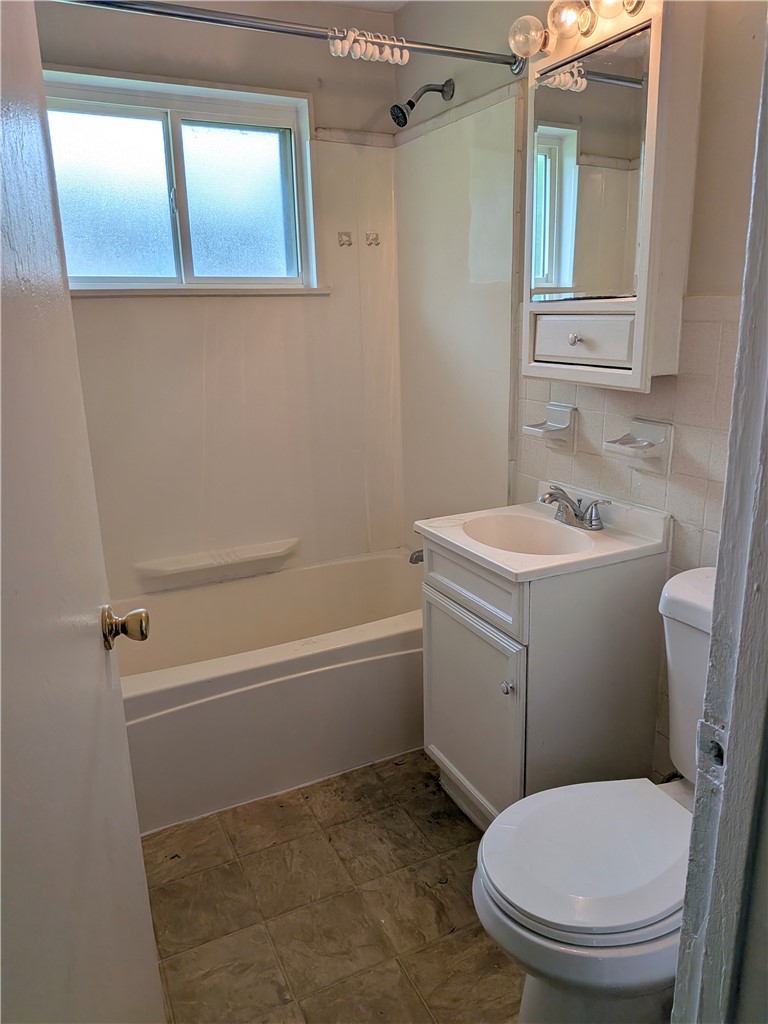 840 Brookfield Road Kettering, OH 45429 - Photo 5 of 13 This clean and functional bathroom offers a bright space for daily routines.