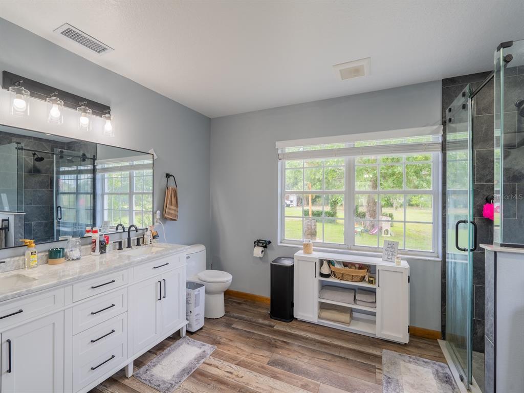 4381 Northeast 105th Place Anthony, FL 32617 - Photo 23 of 49 a very nice looking room with a large window