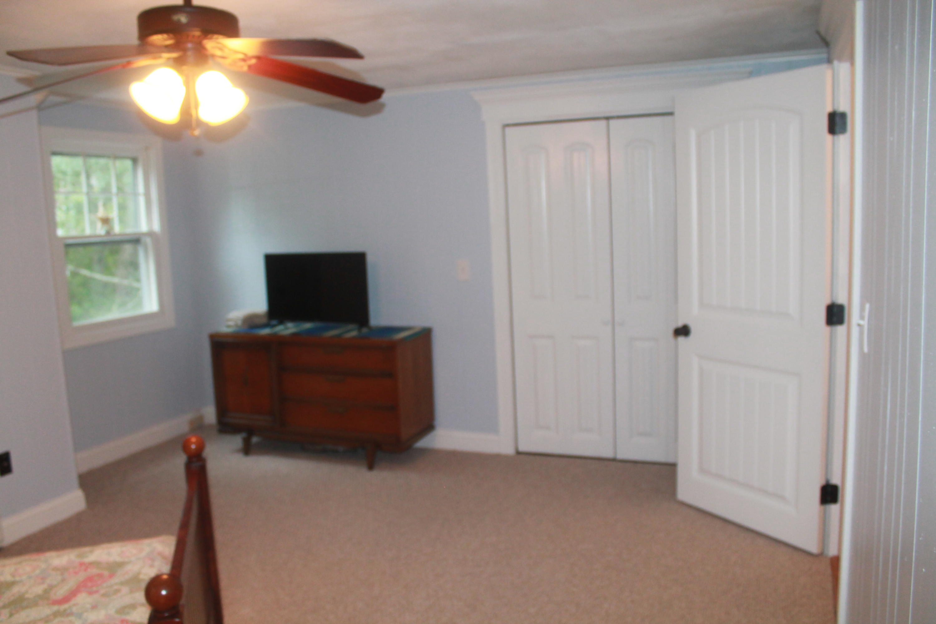 4 Frederick Road Falmouth, MA 02540 - Photo 16 of 27 a living room with furniture and a flat screen tv