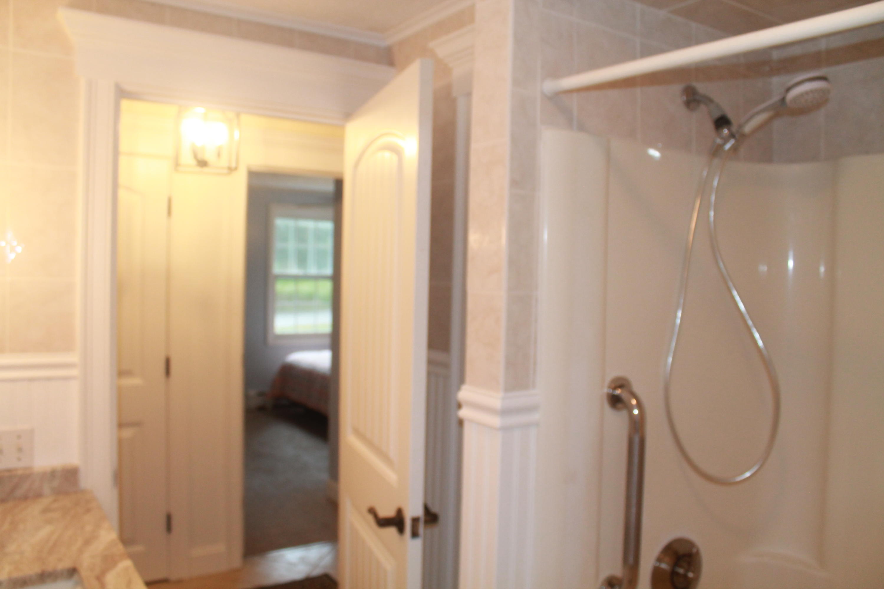 4 Frederick Road Falmouth, MA 02540 - Photo 21 of 27 a bathroom with a glass shower door