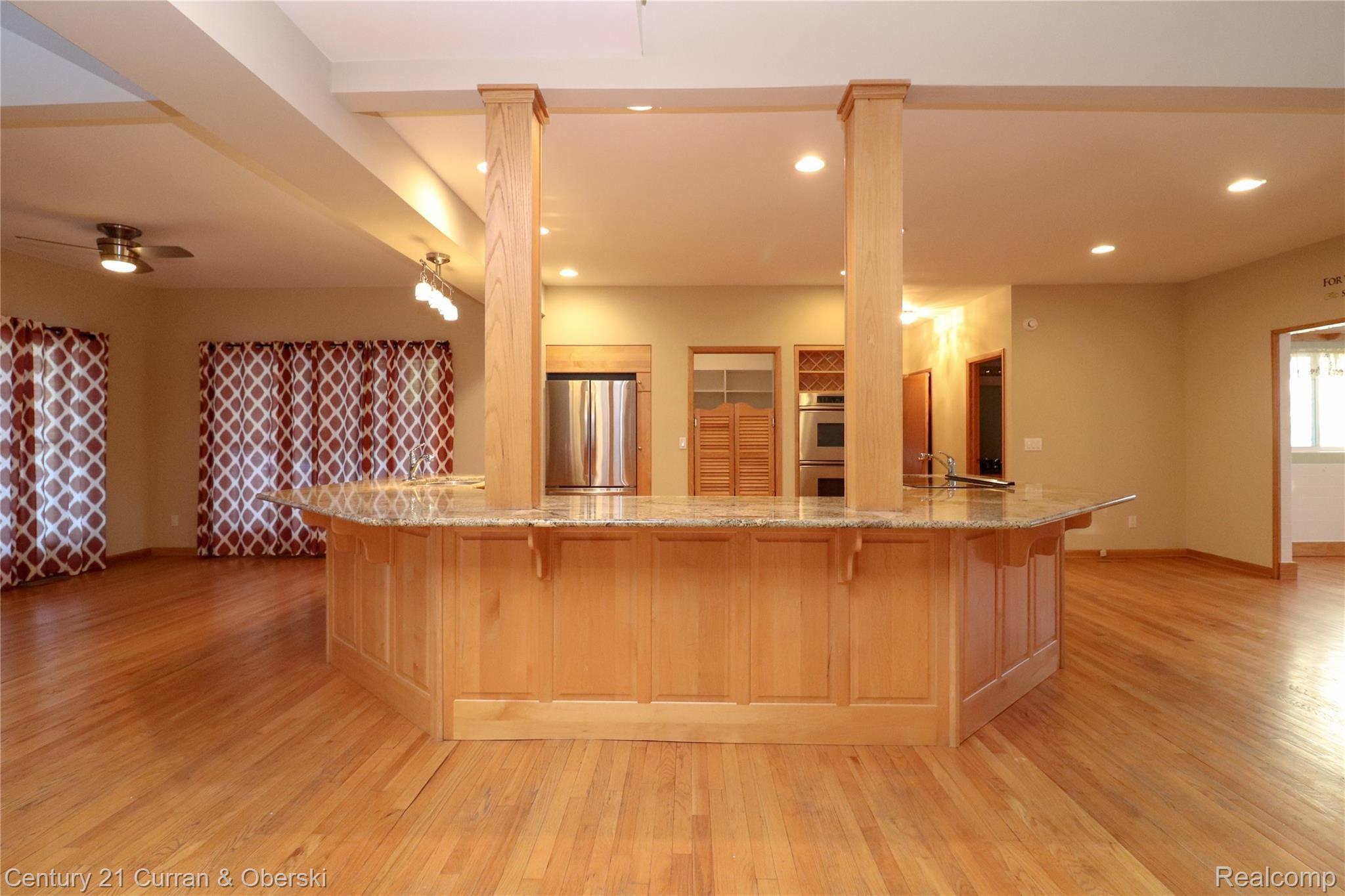 14711 Haggerty Road Belleville, MI 48111 - Photo 11 of 58 gorgeous kitchen with walk-in pantry, granite counters, 2 sinks, stainless steel appliances & breakfast nook