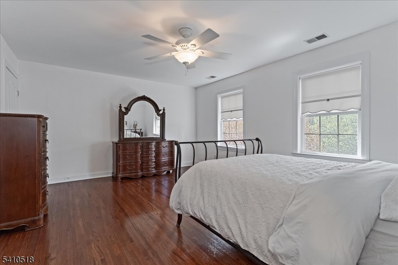 1 Brodziak Road Denville, NJ 07834 - Photo 25 of 42 a bedroom with a bed and a large window