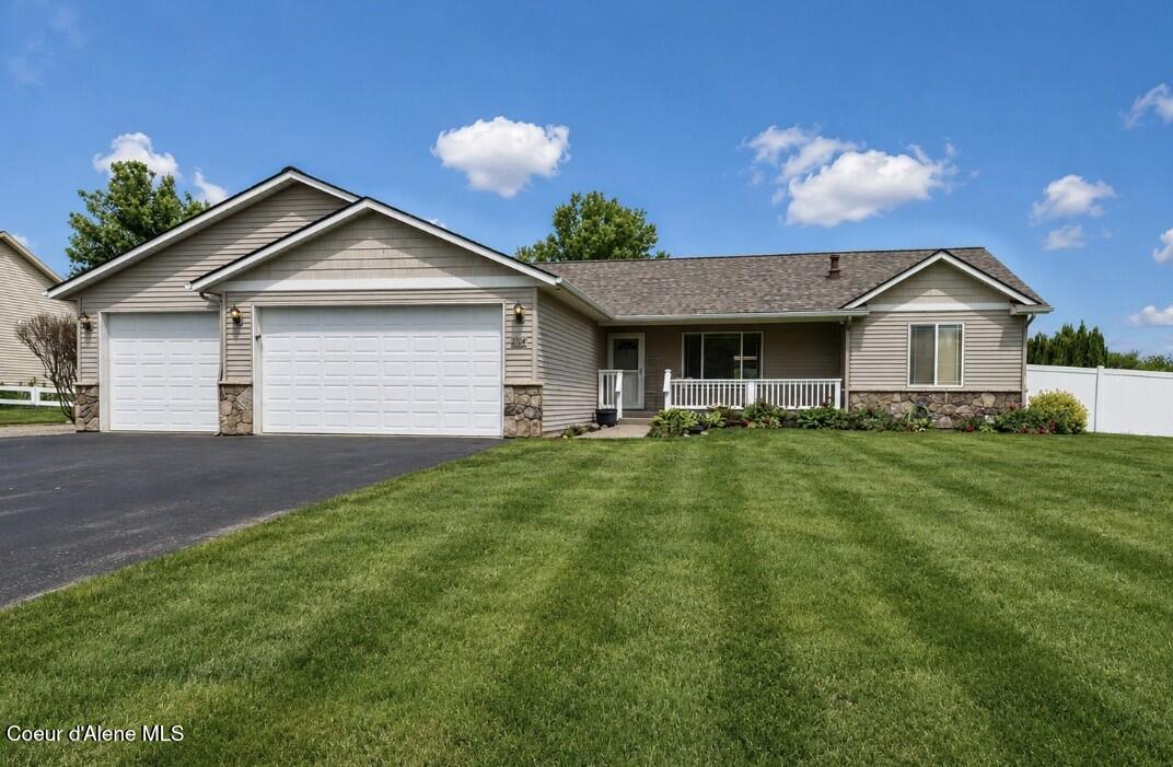 2104 West Evening Star Road Post Falls, ID 83854 - Photo 1 of 22 2104 W Evening Star Rd House Front