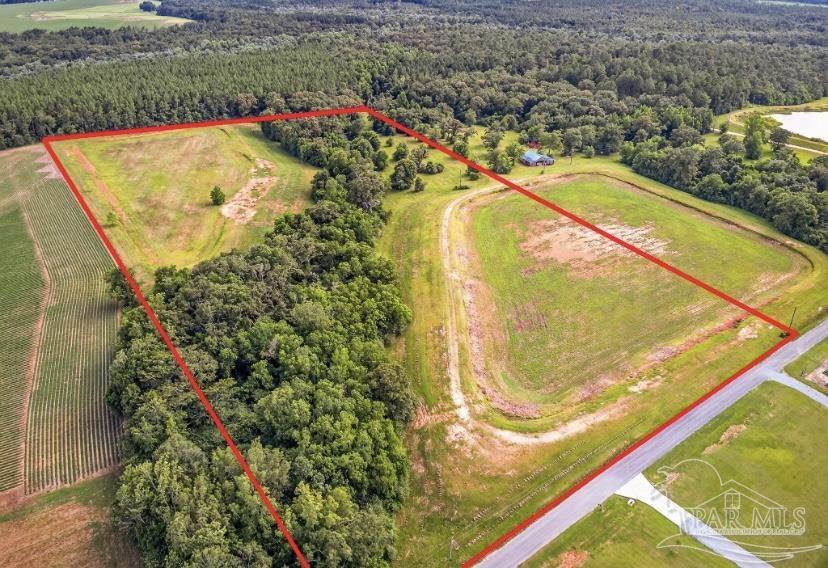 4890 Lemon Road Walnut Hill, FL 32568 - Photo 3 of 14 a view of a swimming pool