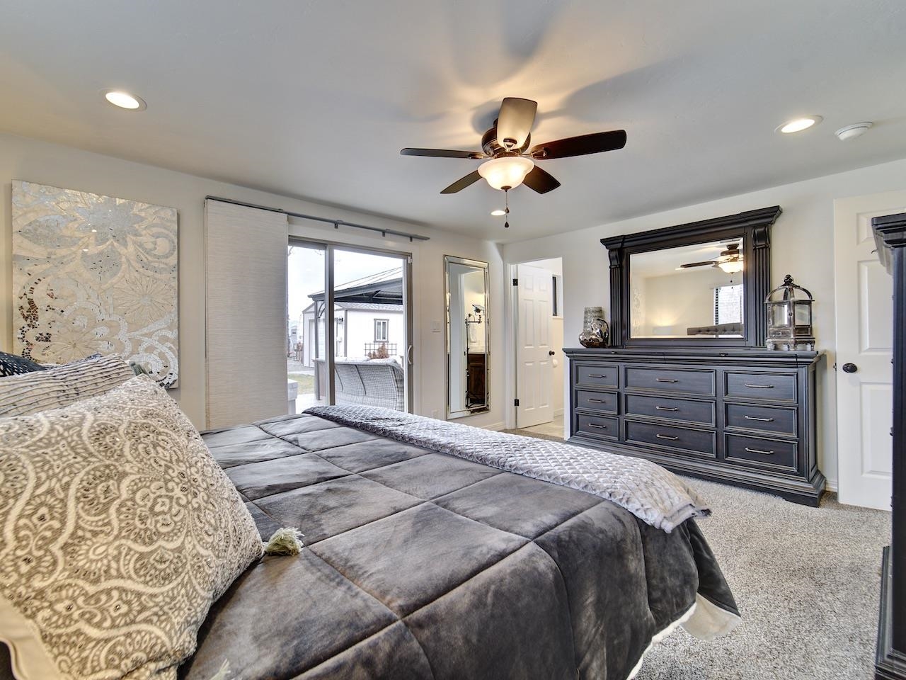 948 26 Road Grand Junction, CO 81506 - Photo 24 of 36 a bedroom with a large bed and a window