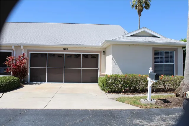 a house view with a garden space