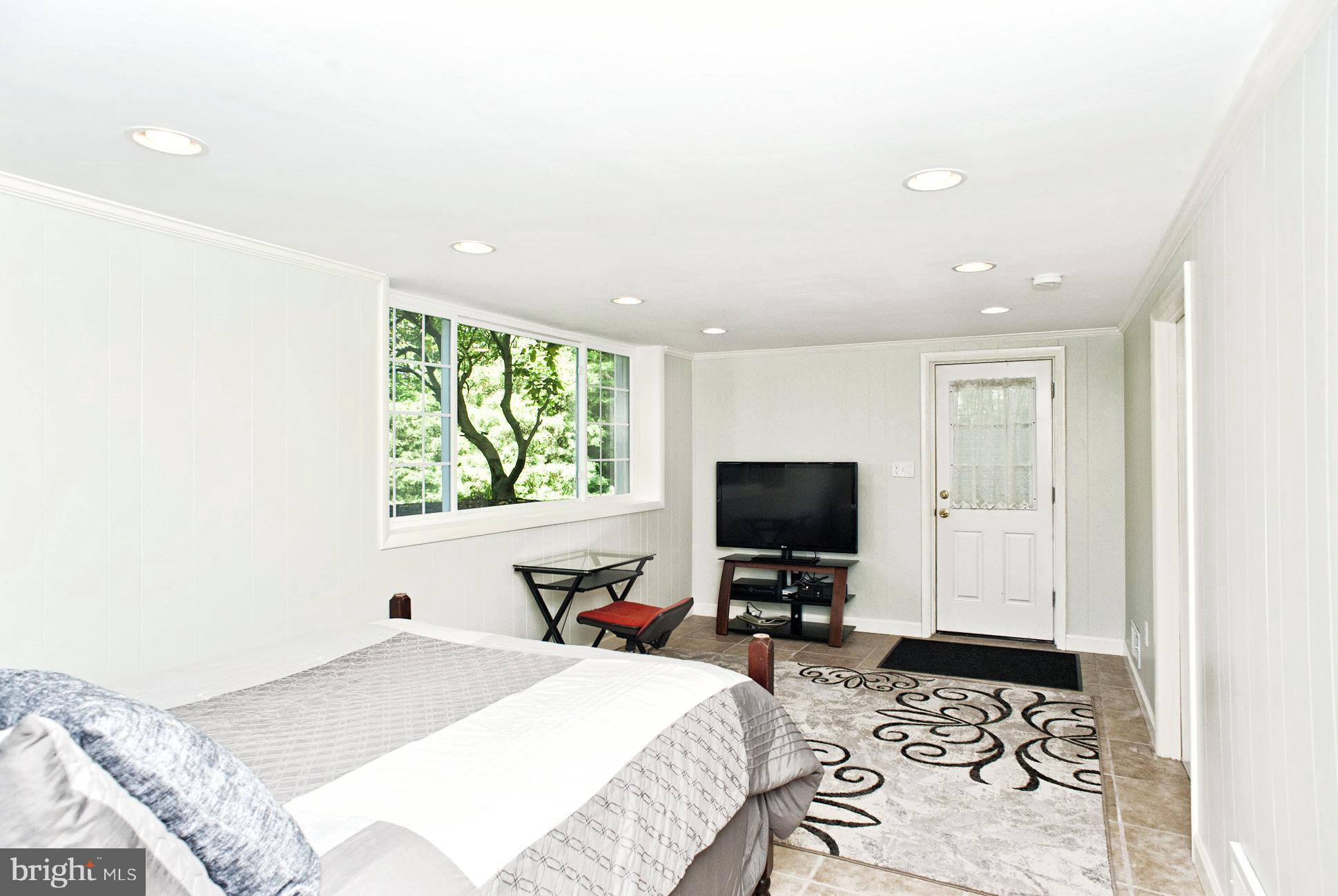11525 Johns Hopkins Road Fulton, MD 20759 - Photo 21 of 29 Bedroom #5 - Located in Lower Level w Exit to Yard
