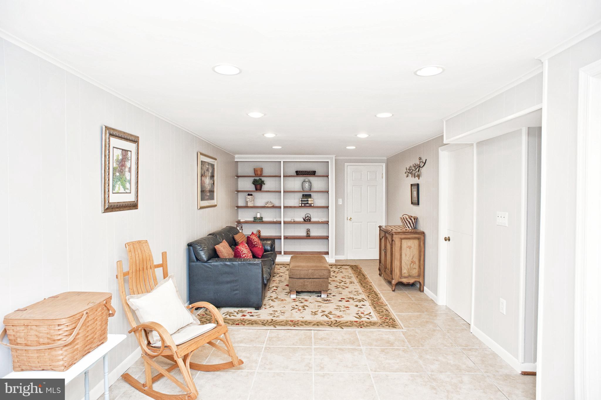 11525 Johns Hopkins Road Fulton, MD 20759 - Photo 23 of 29 Rec Room Alternate View w Door to 5th BR