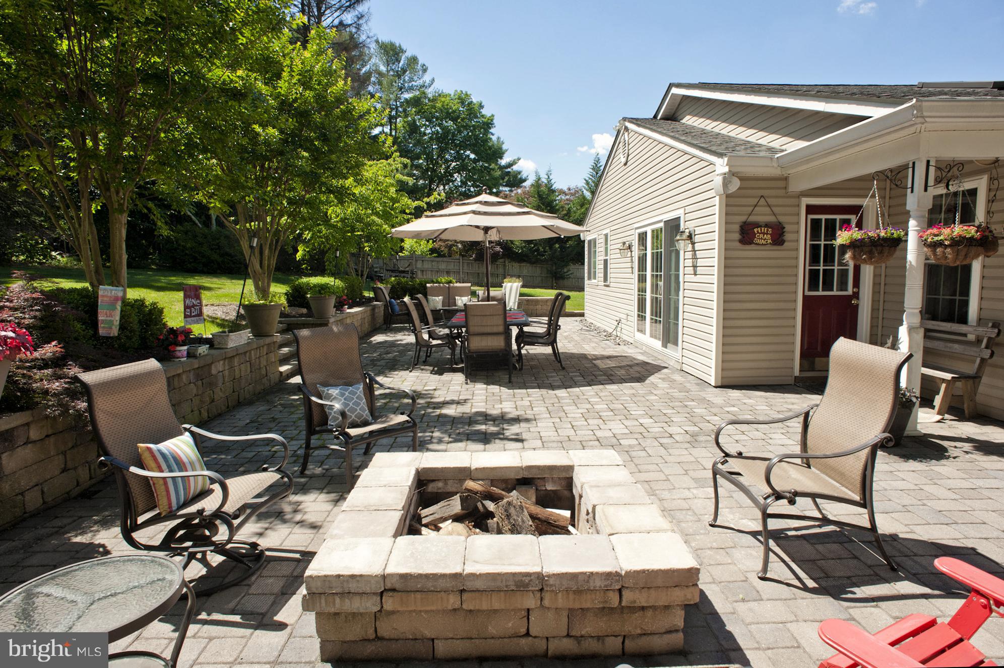 11525 Johns Hopkins Road Fulton, MD 20759 - Photo 25 of 29 Expansive Paver Patio w Built-In Fire Pit