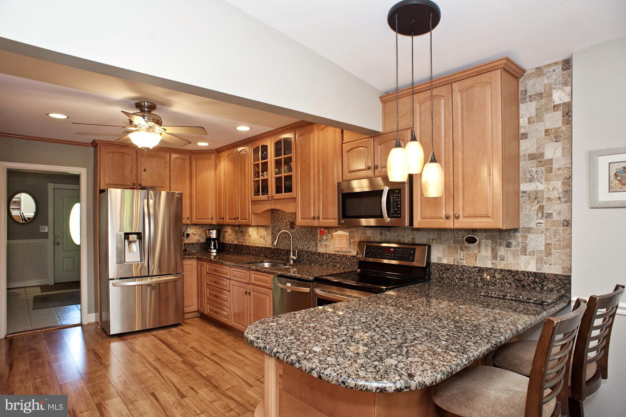 Renovated Kitchen with Granite and S/S Appliances