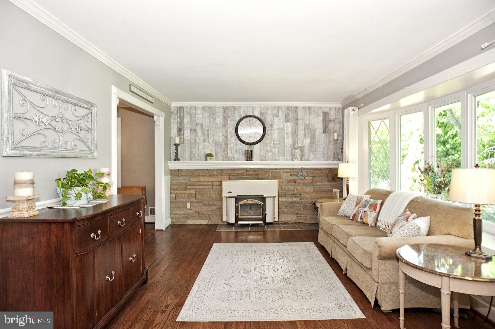 11525 Johns Hopkins Road Fulton, MD 20759 - Photo 9 of 29 Formal Living Room w Wood Stove Insert