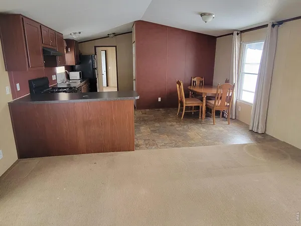 a room with furniture and a window