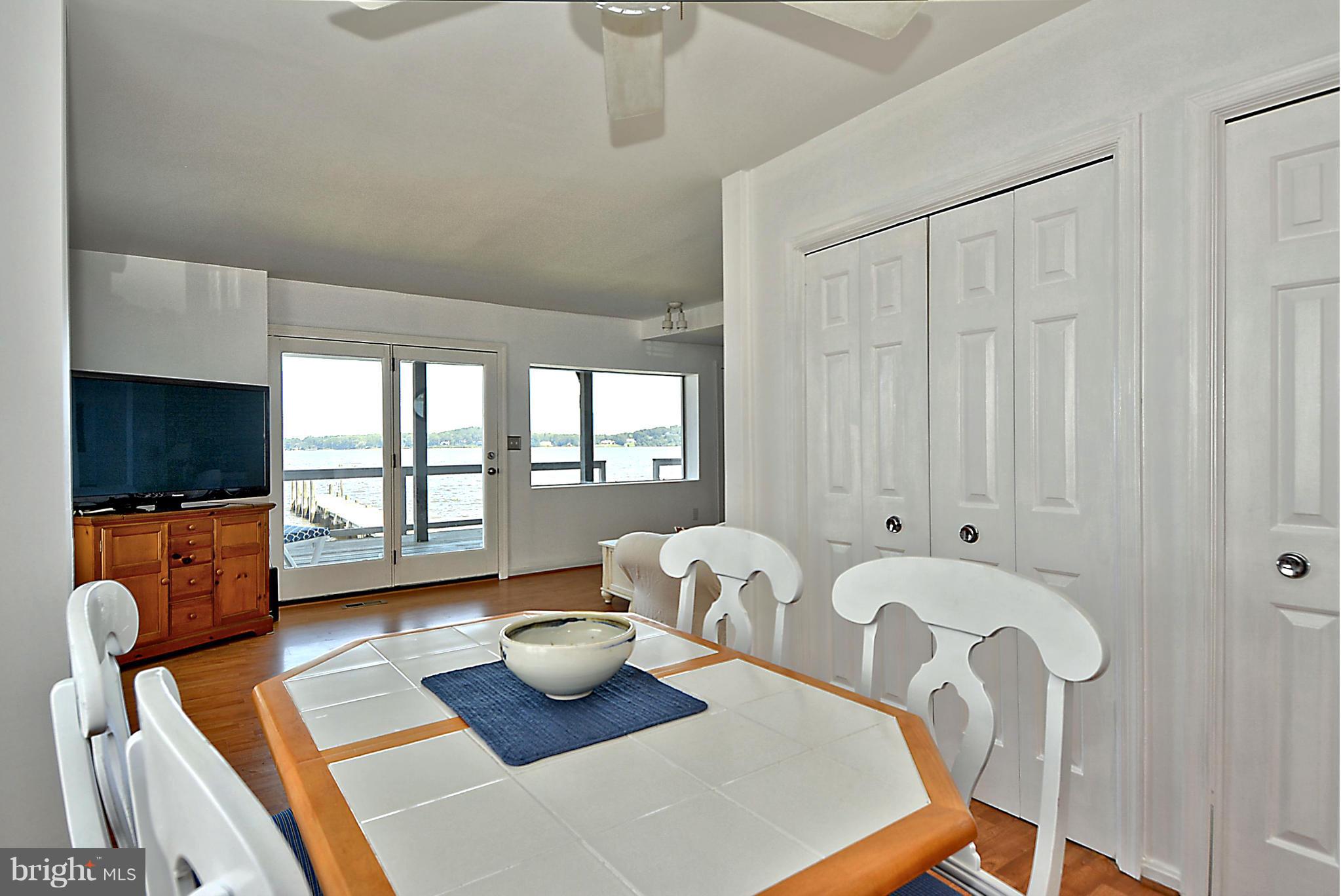 1071 Shore Acres Road Arnold, MD 21012 - Photo 11 of 30 Water View Dining Area / Custom Storage Closets