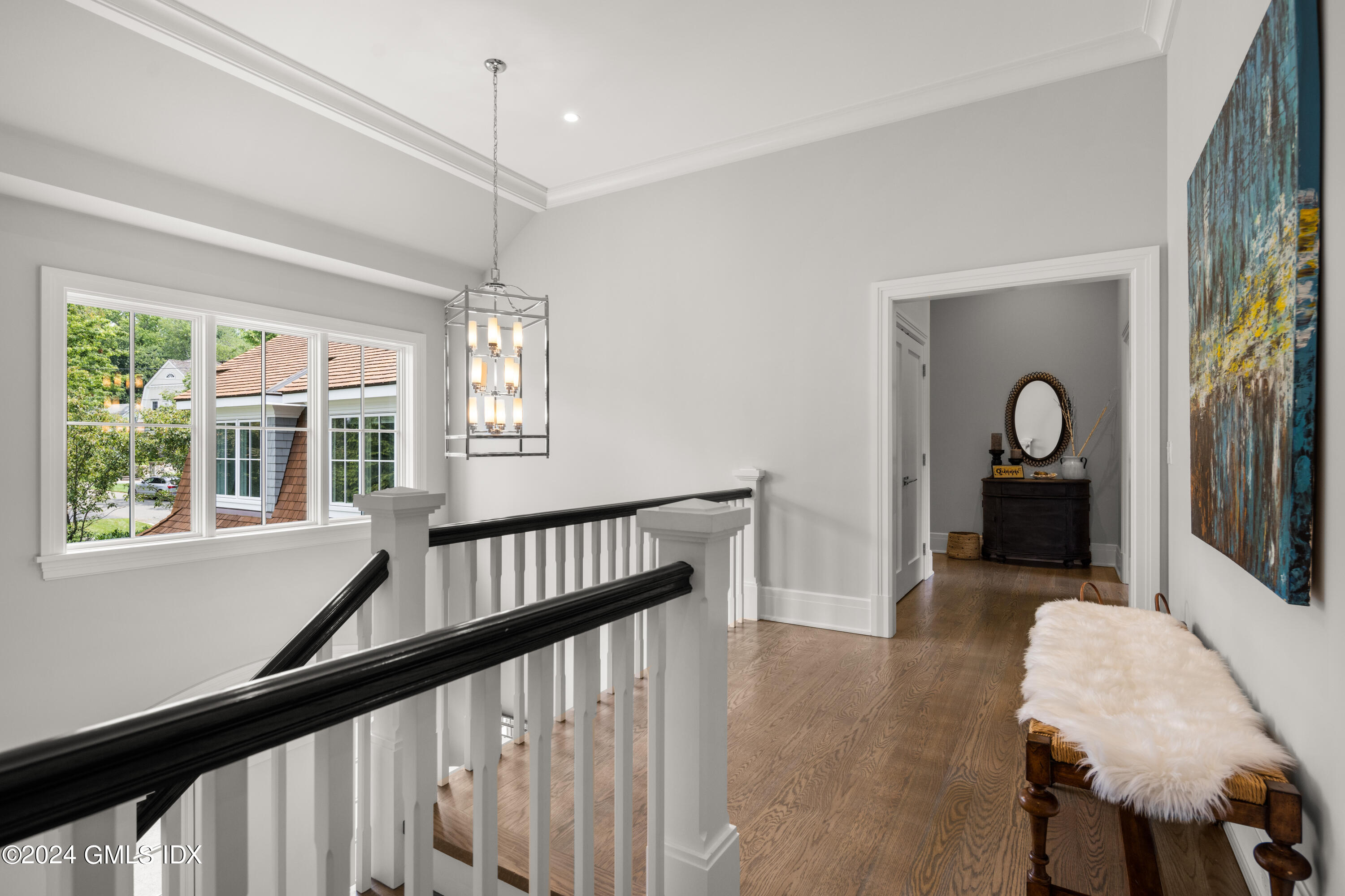 106 Lockwood Road Riverside, CT 06878 - Photo 14 of 38 a view of a hallway with furniture and windows
