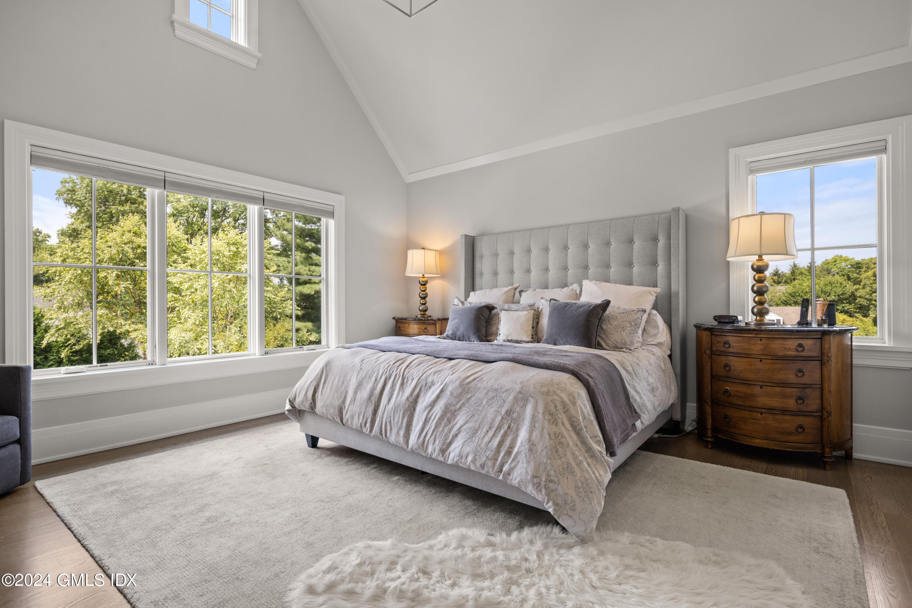 106 Lockwood Road Riverside, CT 06878 - Photo 15 of 38 a spacious bedroom with a bed and window