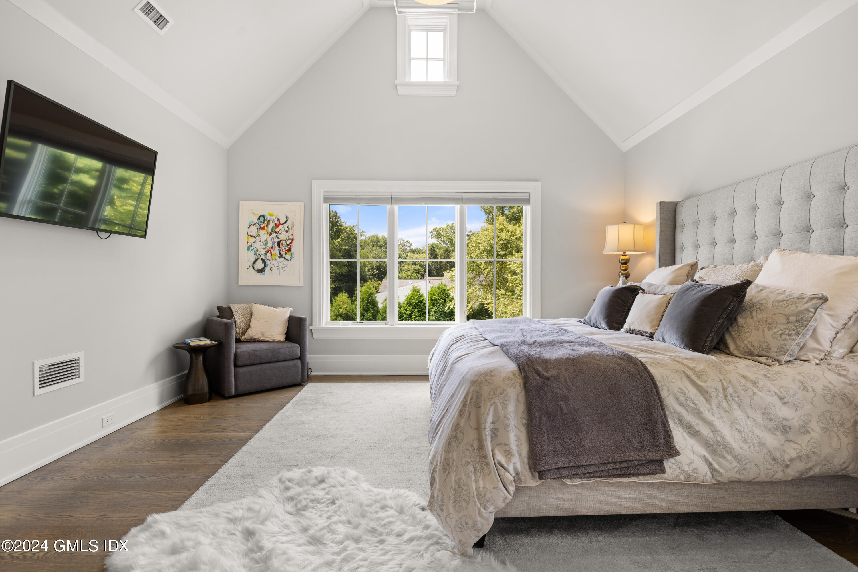 106 Lockwood Road Riverside, CT 06878 - Photo 16 of 38 a bedroom with a large bed and a couch