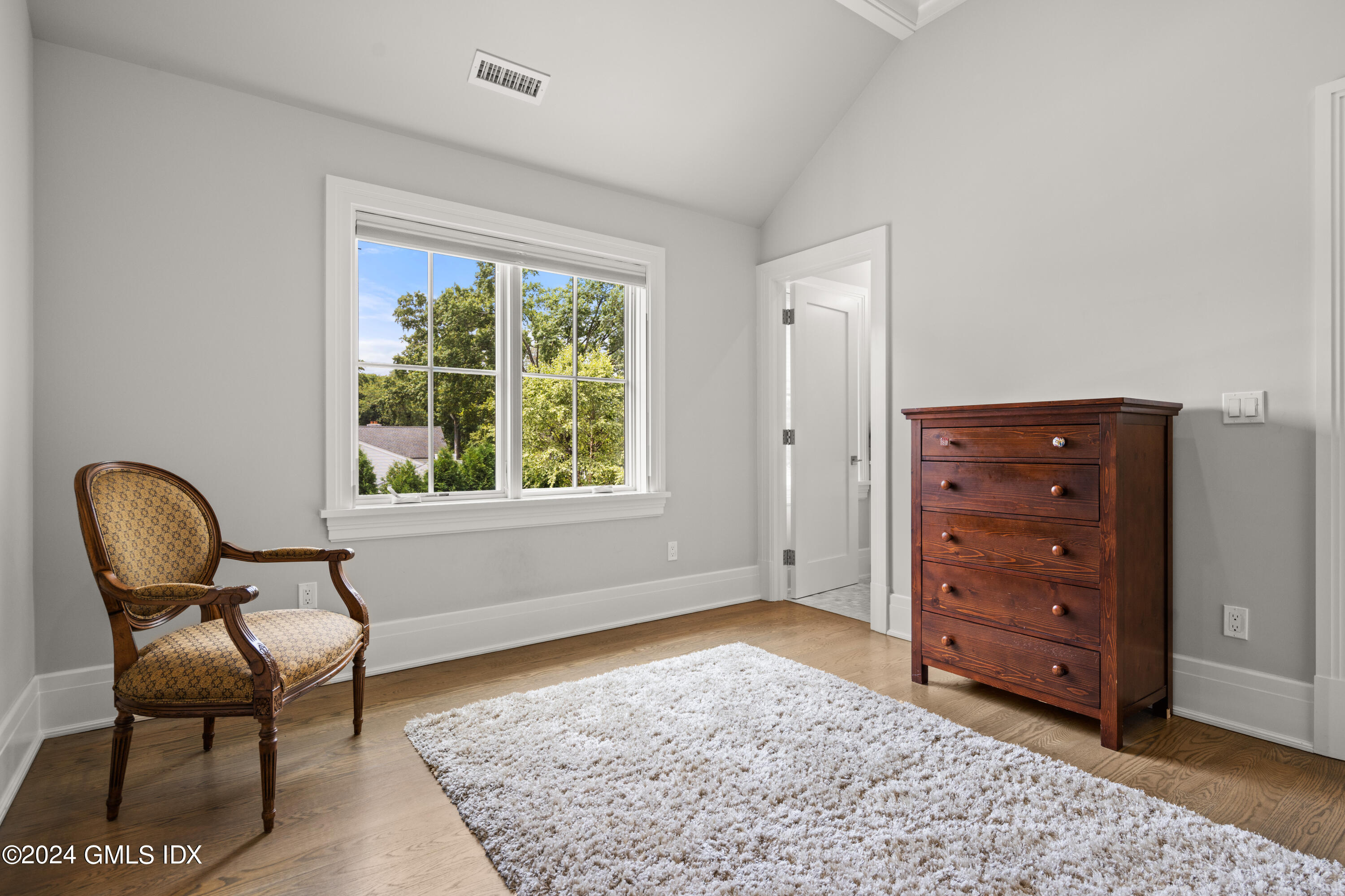 106 Lockwood Road Riverside, CT 06878 - Photo 19 of 38 a living room with furniture and a window
