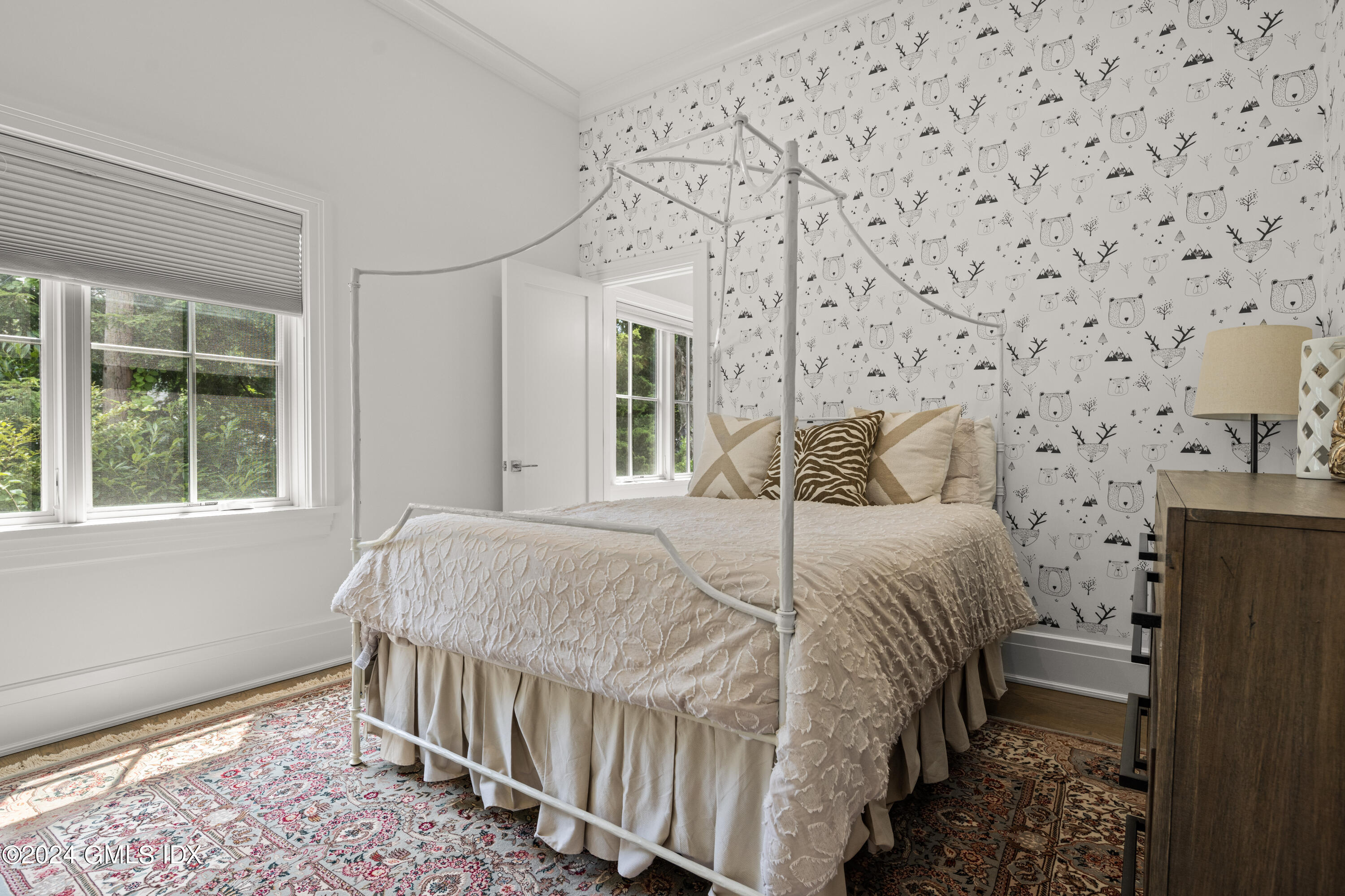 106 Lockwood Road Riverside, CT 06878 - Photo 21 of 38 a bedroom with a bed and a window