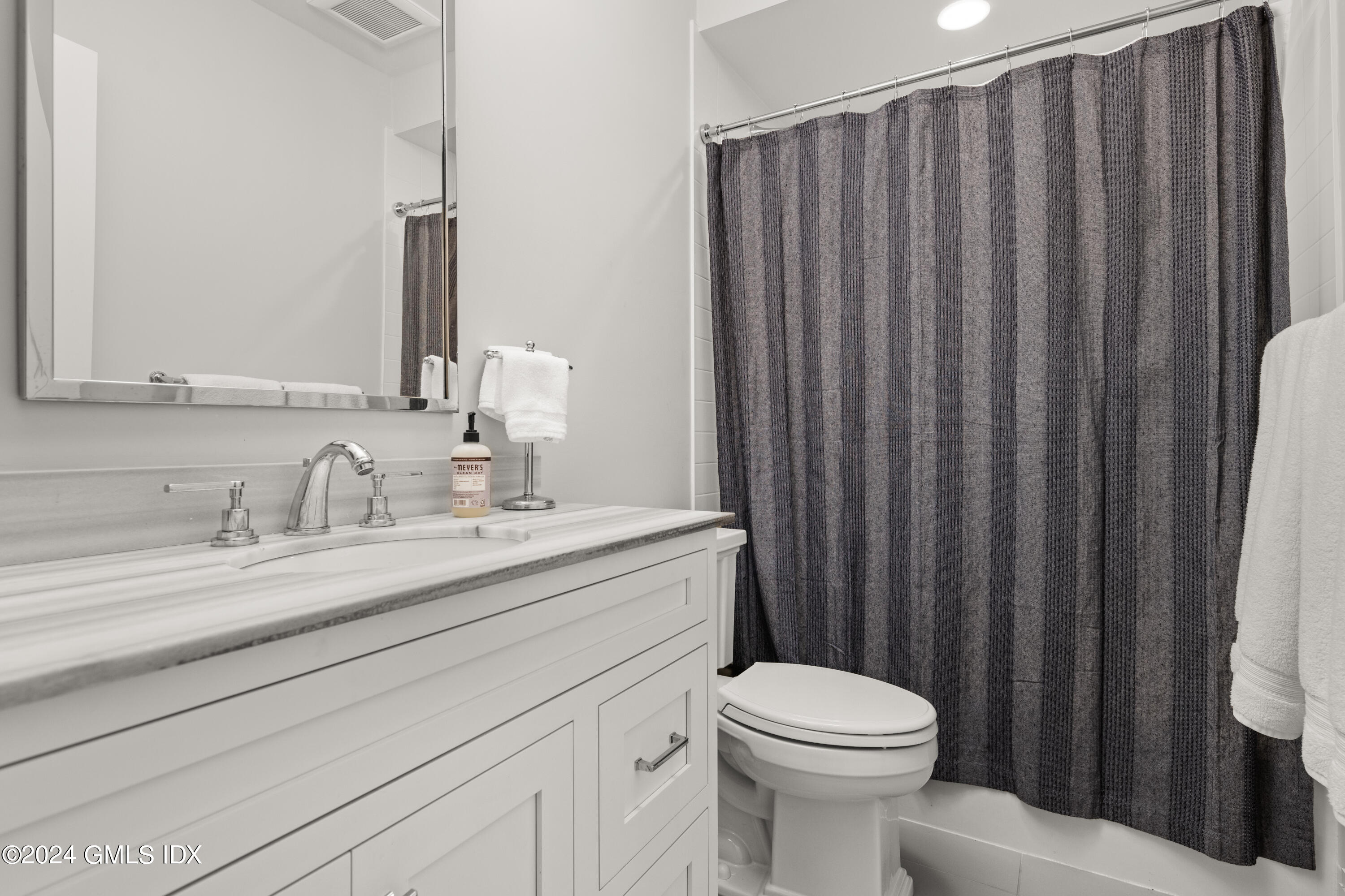 106 Lockwood Road Riverside, CT 06878 - Photo 30 of 38 a bathroom with a sink a toilet and shower