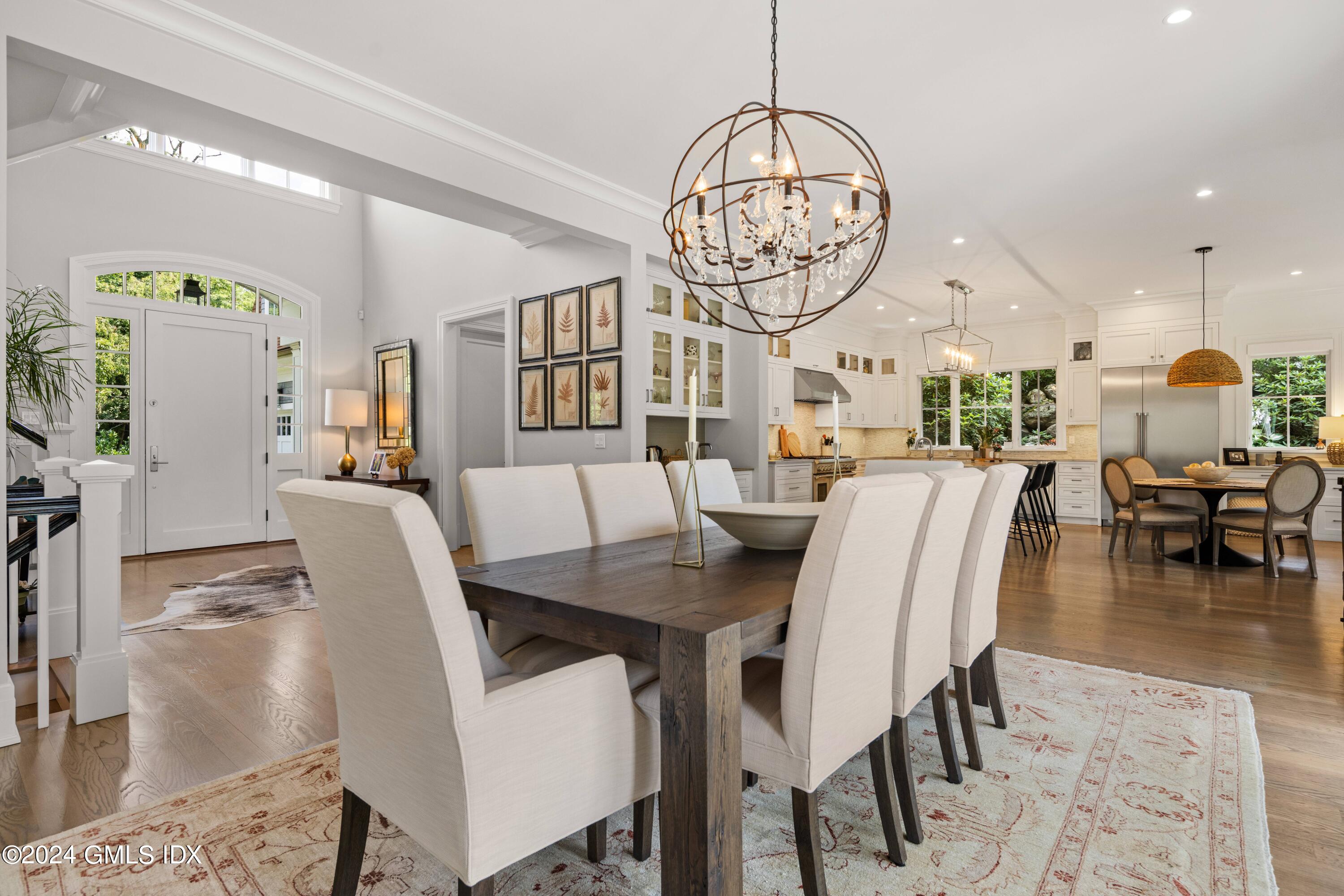 106 Lockwood Road Riverside, CT 06878 - Photo 3 of 38 a view of a dining room with furniture window and wooden floor
