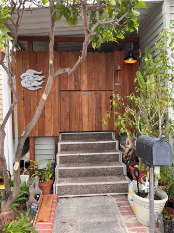 a view of backyard with wooden deck