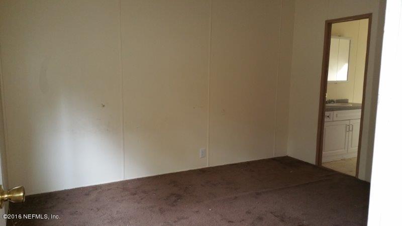 109 Stallion Road Crescent City, FL 32112 - Photo 3 of 6 20160113_085807