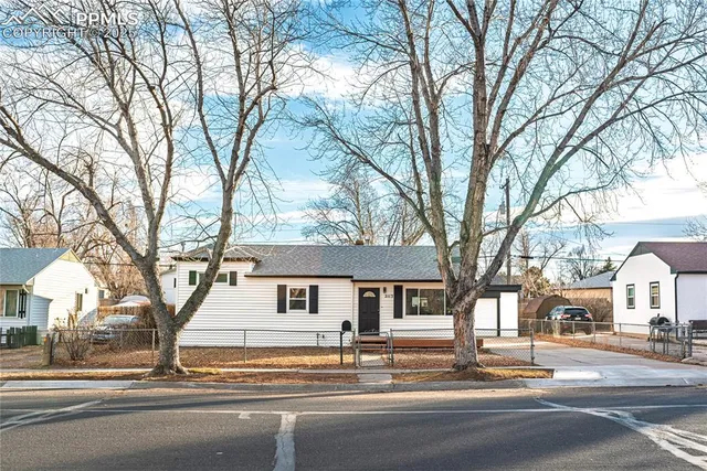 front view of a house with a street view